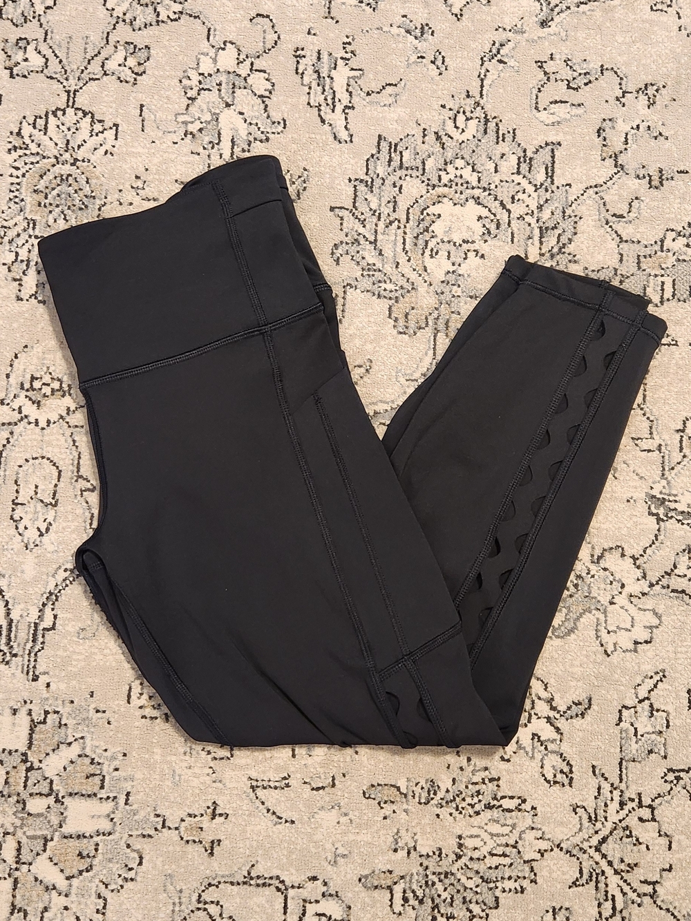 Athleta Black High-Rise Crop Leggings with Side Cutout Design